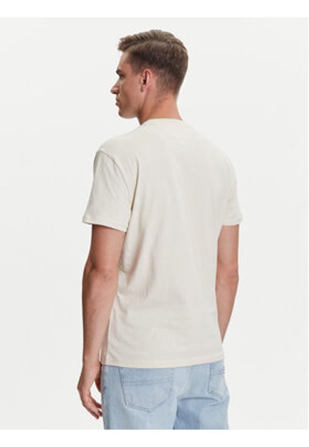 Tommy Jeans T-Shirt Linear Logo DM0DM20744 Beżowy Regular Fit. Kolor: beżowy. Materiał: bawełna