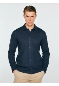 Big-Star - bluzka męska polo z długim rękawem granatowa lisser 403. Typ kołnierza: polo. Kolor: niebieski. Materiał: dresówka, bawełna, jeans, dzianina. Długość rękawa: długi rękaw. Długość: długie. Styl: klasyczny, elegancki #1