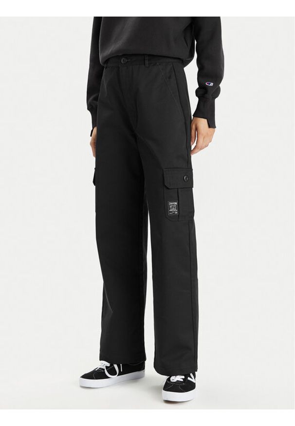Champion Spodnie dresowe 117201 Czarny Relaxed Fit. Kolor: czarny. Materiał: syntetyk