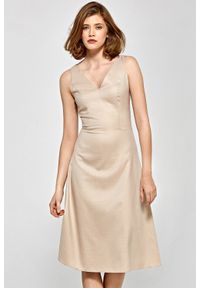 Colett - Elegancka lekko rozkloszowana sukienka z dekoltem V. Długość rękawa: krótki rękaw. Styl: elegancki #1