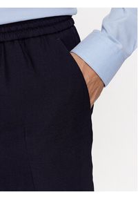 Calvin Klein Spodnie materiałowe K10K109956 Granatowy Regular Fit. Kolor: niebieski. Materiał: wełna #2