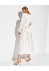 FREE PEOPLE - Biała sukienka z koronkowymi wstawkami. Kolor: biały. Materiał: koronka. Wzór: haft, koronka. Długość: maxi #5