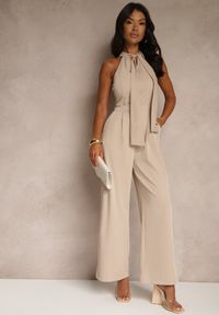 Renee - Beżowy Kombinezon Wide Leg z Ozdobnym Wiązaniem przy Szyi Silelia. Okazja: na co dzień. Kolor: beżowy. Długość rękawa: bez rękawów. Styl: klasyczny, elegancki, casual