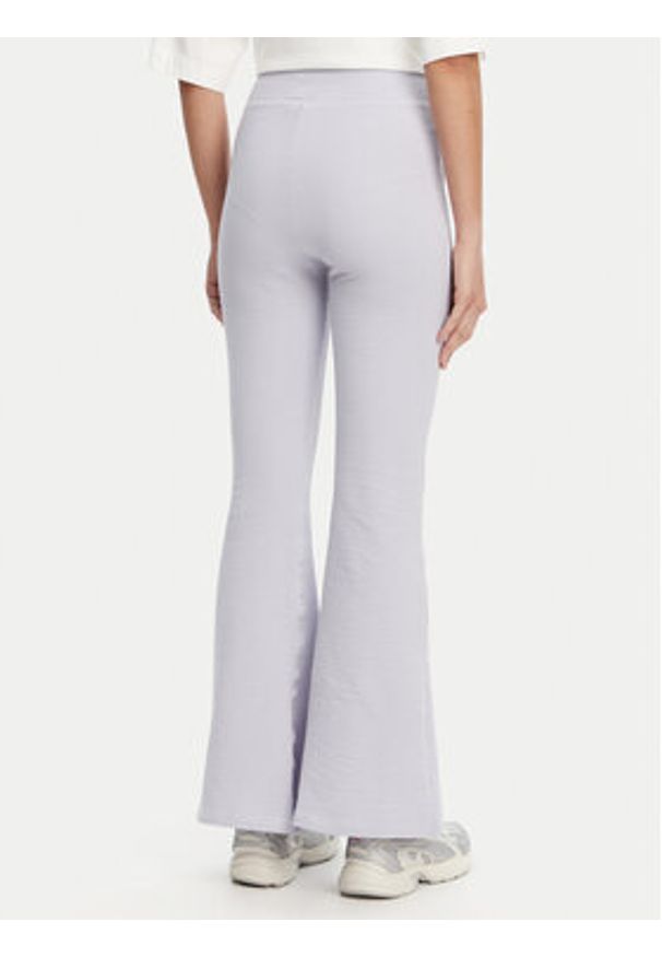 Puma Legginsy Dare To 629809 Fioletowy Slim Fit. Kolor: fioletowy. Materiał: bawełna