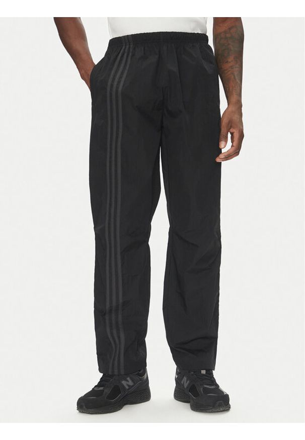 Adidas - adidas Spodnie dresowe Fashion Side Mesh JD0051 Czarny Loose Fit. Kolor: czarny. Materiał: syntetyk