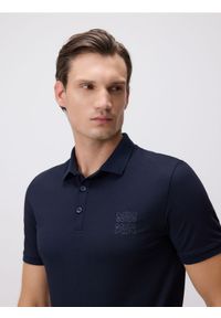 Reserved - Koszulka polo regular fit - granatowy. Typ kołnierza: polo. Kolor: niebieski. Materiał: bawełna, dzianina