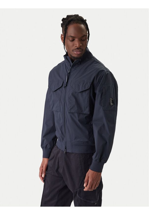 C.P. Company Kurtka przejściowa 20CMOW012A 110264A Granatowy Regular Fit. Kolor: niebieski. Materiał: syntetyk