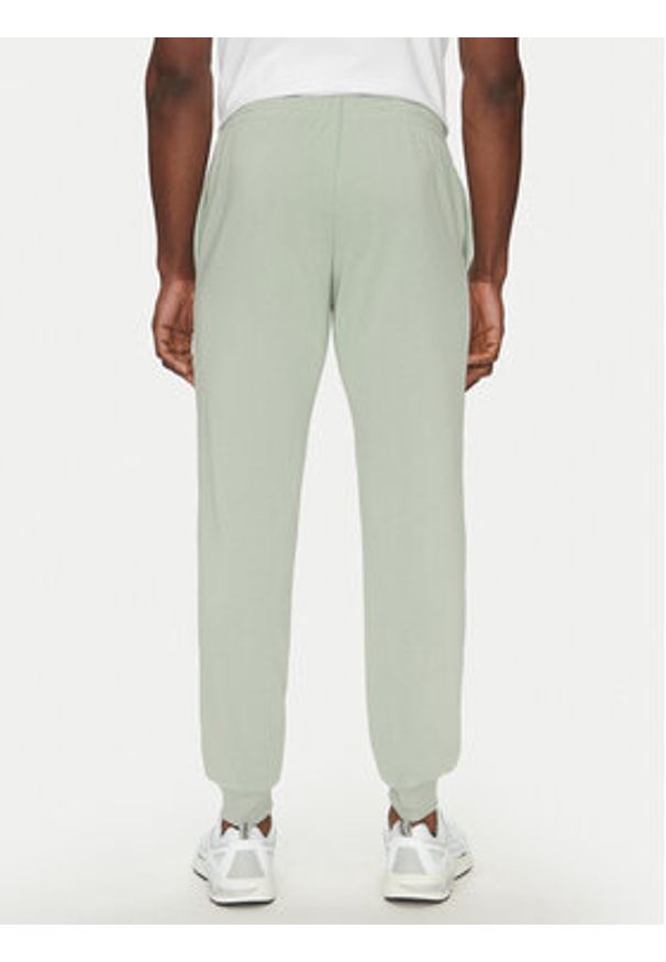 Jack & Jones - Jack&Jones Spodnie dresowe Gordon 12268442 Zielony Regular Fit. Kolor: zielony. Materiał: bawełna