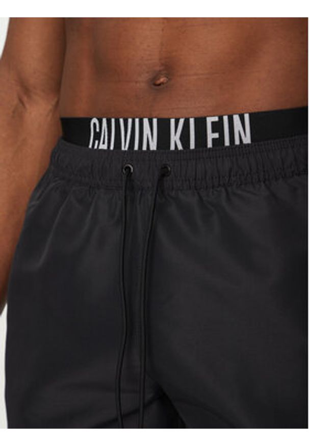 Calvin Klein Swimwear Szorty kąpielowe KM0KM01093 Czarny Regular Fit. Kolor: czarny. Materiał: syntetyk