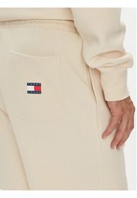 Tommy Jeans Szorty sportowe New Classic Beach DM0DM21781 Beżowy Relaxed Fit. Kolor: beżowy. Materiał: bawełna. Styl: sportowy