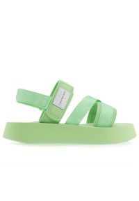 Sandały Calvin Klein Prefresato Sandal Badge YW0YW00967-0H9 - zielone. Zapięcie: rzepy. Kolor: zielony. Materiał: materiał. Szerokość cholewki: normalna. Wzór: paski. Sezon: lato. Obcas: na platformie