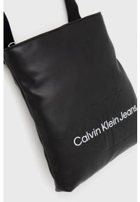 Calvin Klein Jeans - Saszetka. Kolor: czarny. Materiał: materiał, włókno
