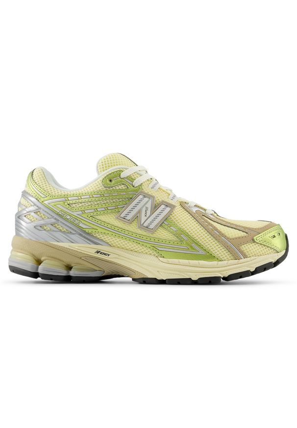 Buty unisex New Balance U1906RND – żółte. Kolor: żółty. Materiał: guma, materiał, syntetyk. Szerokość cholewki: normalna. Sport: turystyka piesza