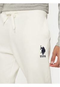 U.S. Polo Assn. Spodnie dresowe MUP0687 Écru Slim Fit. Materiał: bawełna