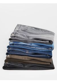 Reserved - Jeansy wide leg - granatowy. Kolor: niebieski