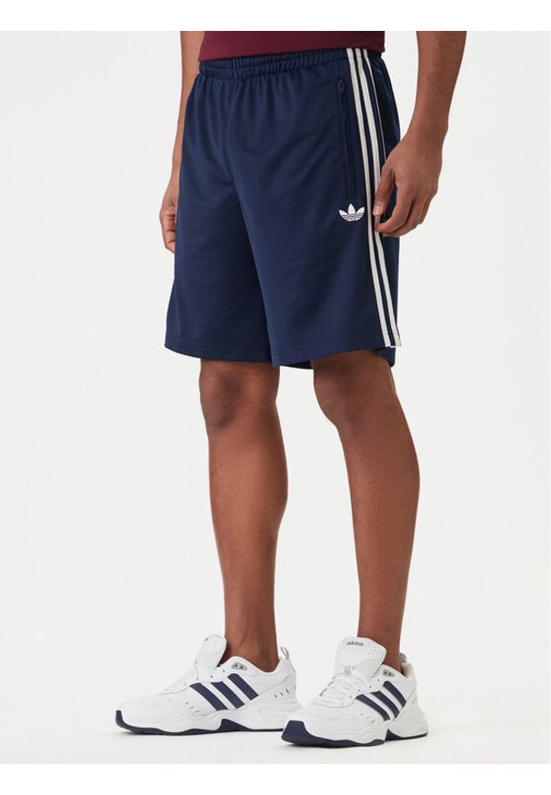 Adidas - adidas Szorty sportowe Firebird KE1374 Granatowy Regular Fit. Kolor: niebieski. Materiał: syntetyk. Styl: sportowy