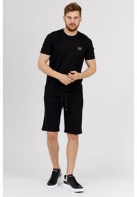 Dolce and Gabbana - DOLCE & GABBANA Czarne szorty męskie z bawełny, Rozmiar 54. Kolor: czarny. Materiał: poliester, bawełna. Wzór: aplikacja #3