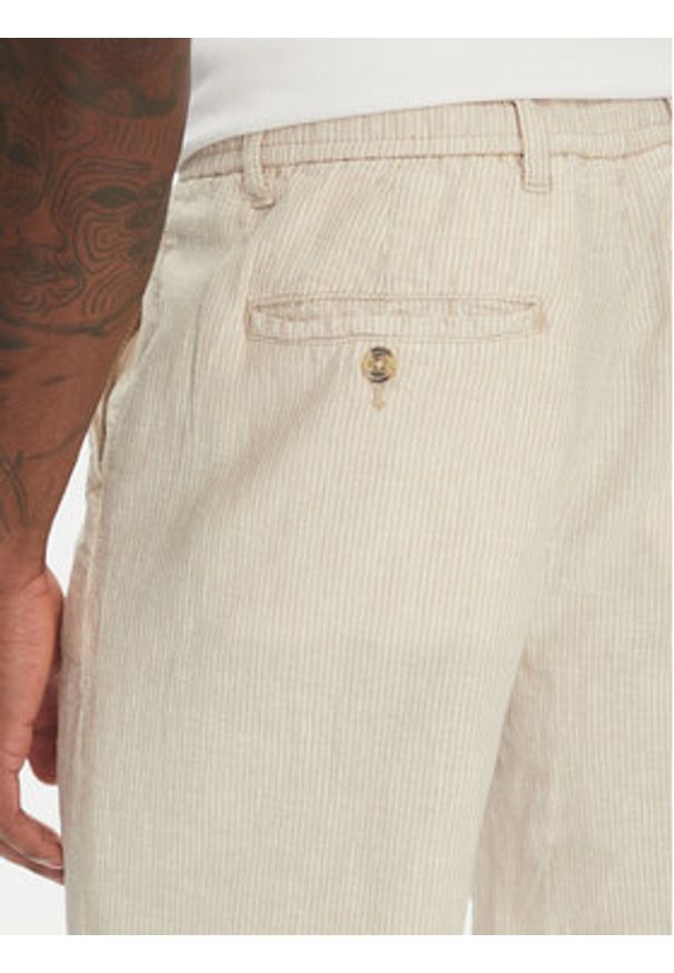 Lindbergh Spodnie materiałowe 30-003030 Beżowy Relaxed Fit. Kolor: beżowy. Materiał: bawełna