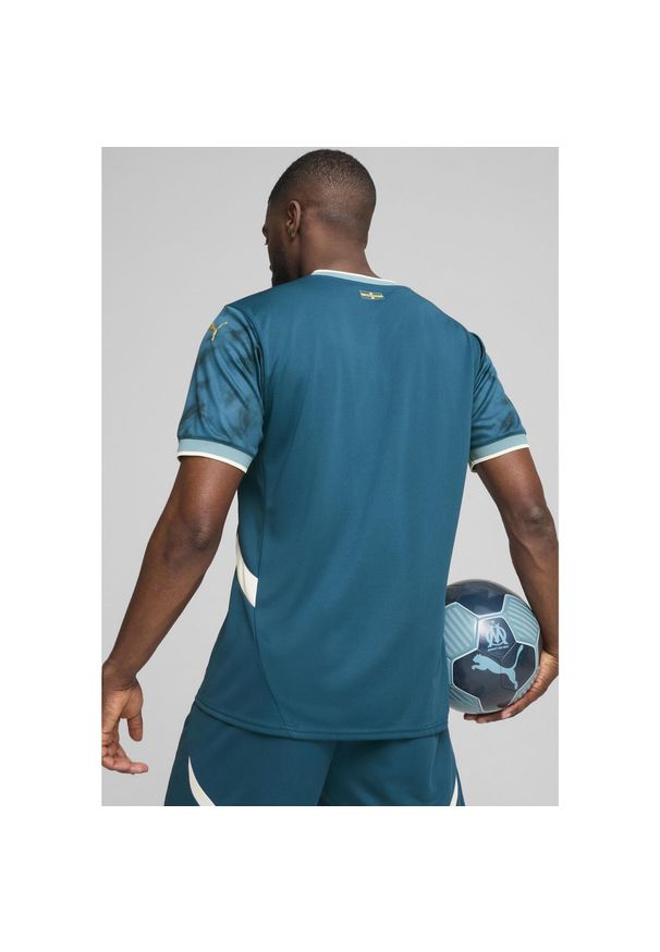 Puma - Koszulka wyjazdowa OM 2024/25. Kolor: niebieski
