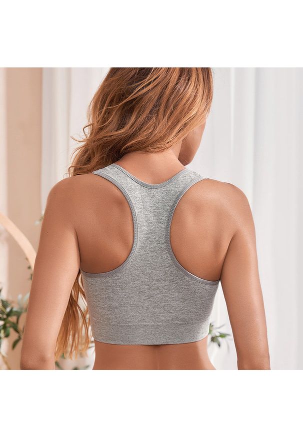 Intica - Biustonosz sportowy z piankowym wzmocnieniem do treningu Zwantje. Kolor: czarny. Materiał: materiał