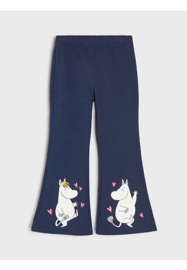 Sinsay - Bawełniane spodnie flare z nadrukiem Moomin - granatowy. Kolor: niebieski. Materiał: bawełna. Wzór: nadruk