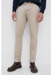 Armani Exchange Spodnie męskie kolor beżowy w fasonie chinos. Okazja: na co dzień. Kolor: beżowy. Materiał: tkanina. Wzór: gładki. Styl: casual