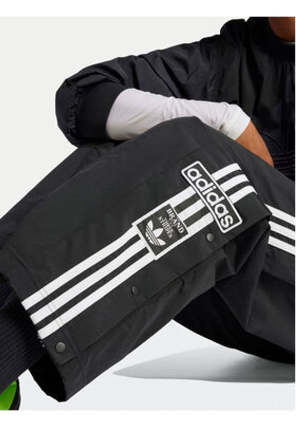 Adidas - adidas Spodnie dresowe adicolor Adibreak JD0857 Czarny Loose Fit. Kolor: czarny. Materiał: syntetyk