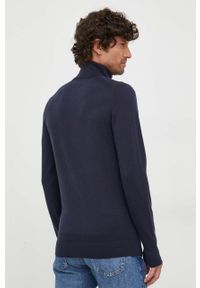 Calvin Klein sweter wełniany męski kolor granatowy lekki z golferm. Typ kołnierza: golf. Kolor: niebieski. Materiał: wełna #4