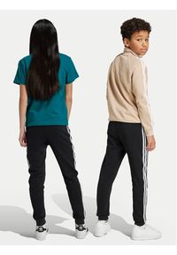 Adidas - adidas Spodnie dresowe Trefoil IY7484 Czarny Regular Fit. Kolor: czarny. Materiał: bawełna
