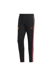 Adidas - Manchester United DNA 3-Stripes Pants. Kolor: czarny. Materiał: dresówka