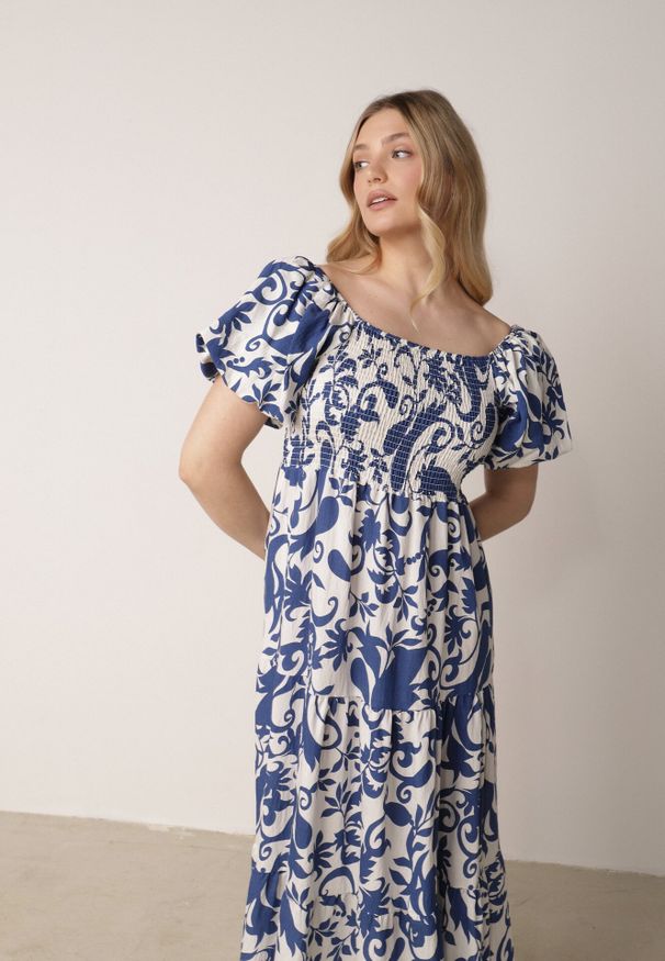 Born2be - Niebieska Rozkloszowana Sukienka z Wiskozy z Bufiastymi Rękawami w Roślinny Wzór Semea. Okazja: do pracy, na co dzień, na spotkanie biznesowe. Kolor: niebieski. Materiał: wiskoza. Sezon: lato. Typ sukienki: proste, rozkloszowane. Styl: biznesowy, casual. Długość: maxi