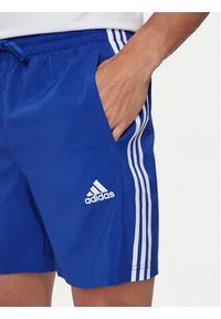 Adidas - adidas Szorty sportowe Essentials Chelsea IC1487 Niebieski Regular Fit. Kolor: niebieski. Materiał: syntetyk. Styl: sportowy