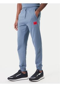 Hugo - HUGO Spodnie dresowe Doak212 50447963 Granatowy Regular Fit. Kolor: niebieski. Materiał: bawełna #1