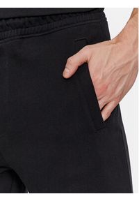 BOSS - Boss Spodnie dresowe Seteam 50497004 Czarny Relaxed Fit. Kolor: czarny. Materiał: bawełna