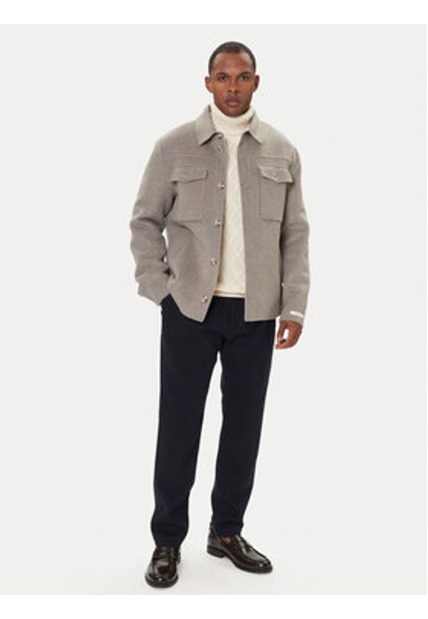 TOMMY HILFIGER - Tommy Hilfiger Chinosy Harlem MW0MW40340 Granatowy Tapered Fit. Kolor: niebieski. Materiał: syntetyk