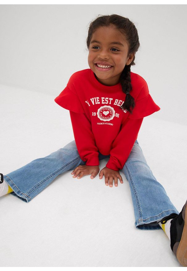 bonprix - Dżinsy bootcut ze średnim stanem. Kolor: niebieski