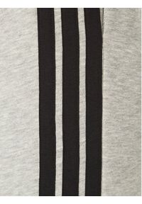Adidas - adidas Spodnie dresowe Essentials 3-Stripes JE6318 Szary Regular Fit. Kolor: szary. Materiał: syntetyk, bawełna #2