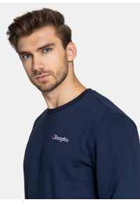 Bluza męska Champion Organic Cotton Blend Small Script Logo (216476-BS538). Kolor: niebieski. Materiał: materiał. Styl: elegancki, sportowy