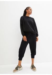 bonprix - Spodnie haremki do relaksu, dł. 3/4. Kolor: czarny. Materiał: materiał, jersey. Styl: sportowy #3