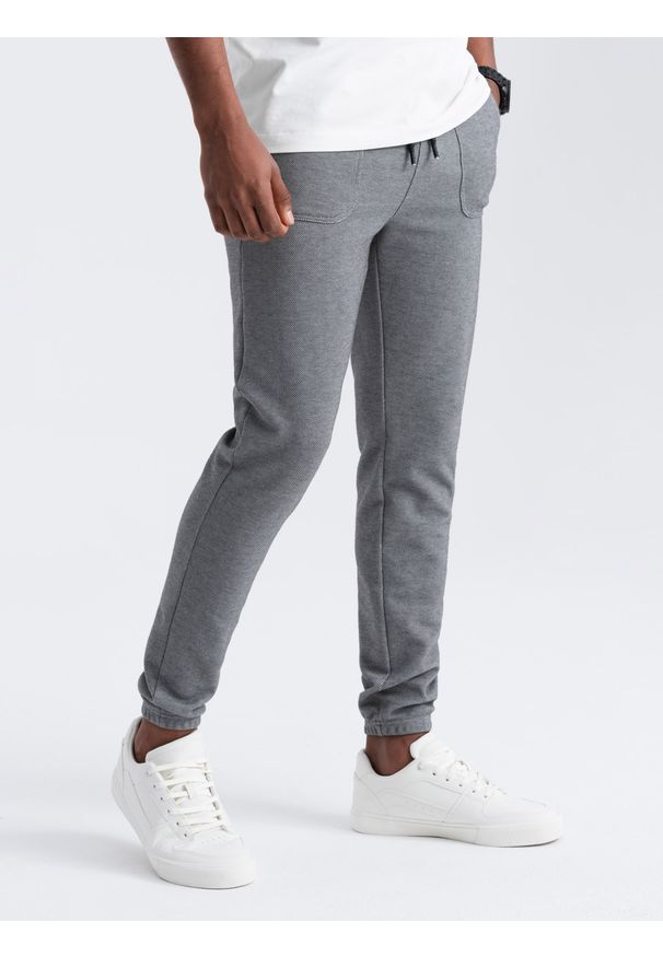 Ombre Clothing - Spodnie męskie dresowe ze strukturalnej dzianiny - grafitowe V5. Kolor: szary. Materiał: dzianina, dresówka. Wzór: melanż, aplikacja, ze splotem. Styl: elegancki