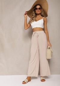Renee - Beżowe Bawełniane Szerokie Spodnie Kuloty High Waist z Gumką w Talii Evitaes. Okazja: na co dzień, na spotkanie biznesowe. Stan: podwyższony. Kolor: beżowy. Materiał: bawełna. Styl: biznesowy, elegancki, casual