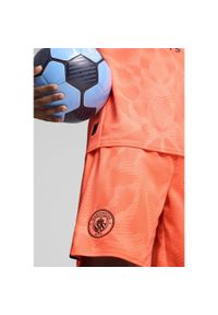 Puma - Szorty bramkarskie Manchester City 24/25 PUMA Neon Sun Orange. Kolor: żółty, pomarańczowy, wielokolorowy