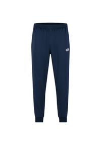Spodnie do biegania Jako Retro. Kolor: niebieski. Materiał: materiał. Sport: piłka nożna