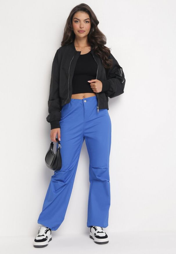 Born2be - Niebieskie Szerokie Spodnie ze Stoperami Dalfo. Kolor: niebieski