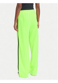 Adidas - adidas Spodnie dresowe adicolor Classic Firebird JW1228 Zielony Loose Fit. Kolor: zielony. Materiał: syntetyk #4
