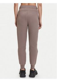 Nike Spodnie dresowe Tech Fleece HV6779 Brązowy Regular Fit. Kolor: brązowy. Materiał: bawełna #5