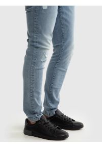 Big-Star - Sneakersy męskie ze skóry ekologicznej czarne OO174019 906. Okazja: na spacer, na co dzień. Nosek buta: okrągły. Kolor: czarny. Materiał: skóra ekologiczna. Szerokość cholewki: normalna. Sport: turystyka piesza