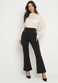 Born2be - Czarno-Beżowy Elegancki Kombinezon z Koszulową Górą z Wiązaniem i Ozdobnymi Guzikami Noriti. Okazja: na co dzień, na spotkanie biznesowe, do pracy. Kolor: czarny. Materiał: skóra. Długość rękawa: długi rękaw. Długość: długie. Styl: elegancki #7