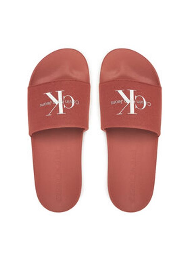 Calvin Klein Jeans Klapki Slide Monogram Cv YM0YM01271 Koralowy. Kolor: pomarańczowy. Materiał: materiał