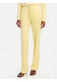 Juicy Couture Spodnie dresowe Tina JCAPW045 Żółty Regular Fit. Kolor: żółty. Materiał: syntetyk